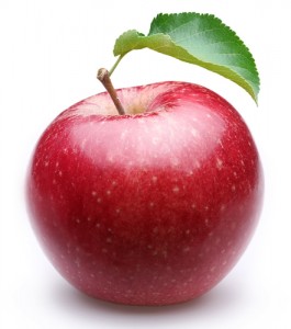 Ripe red apple with a leaf. Isolated on a white background.
